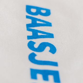 Baasje rompertje materiaal opdruk